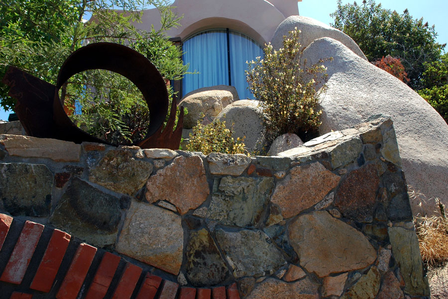 Stone wall and boulders.