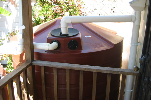 Rainwater Collection Barrell at Brook Sarson's home. Photo by Kellyn Sanderson. Rainwater Collection Barrell at Brook Sarson's home. Photo by Kellyn Sanderson.
