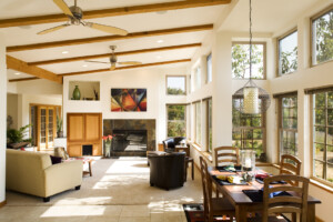Open-plan interior with hillside views. Photo by Scot Conti.