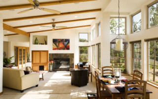 Open-plan interior with hillside views. Photo by Scot Conti.